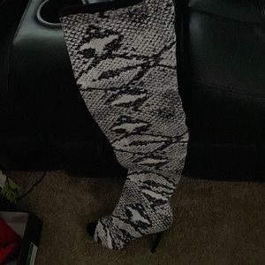 Zebra print thigh high boots comfortable and easy to walk in